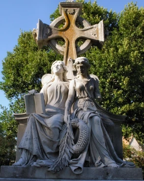 women-statue-cross-monument